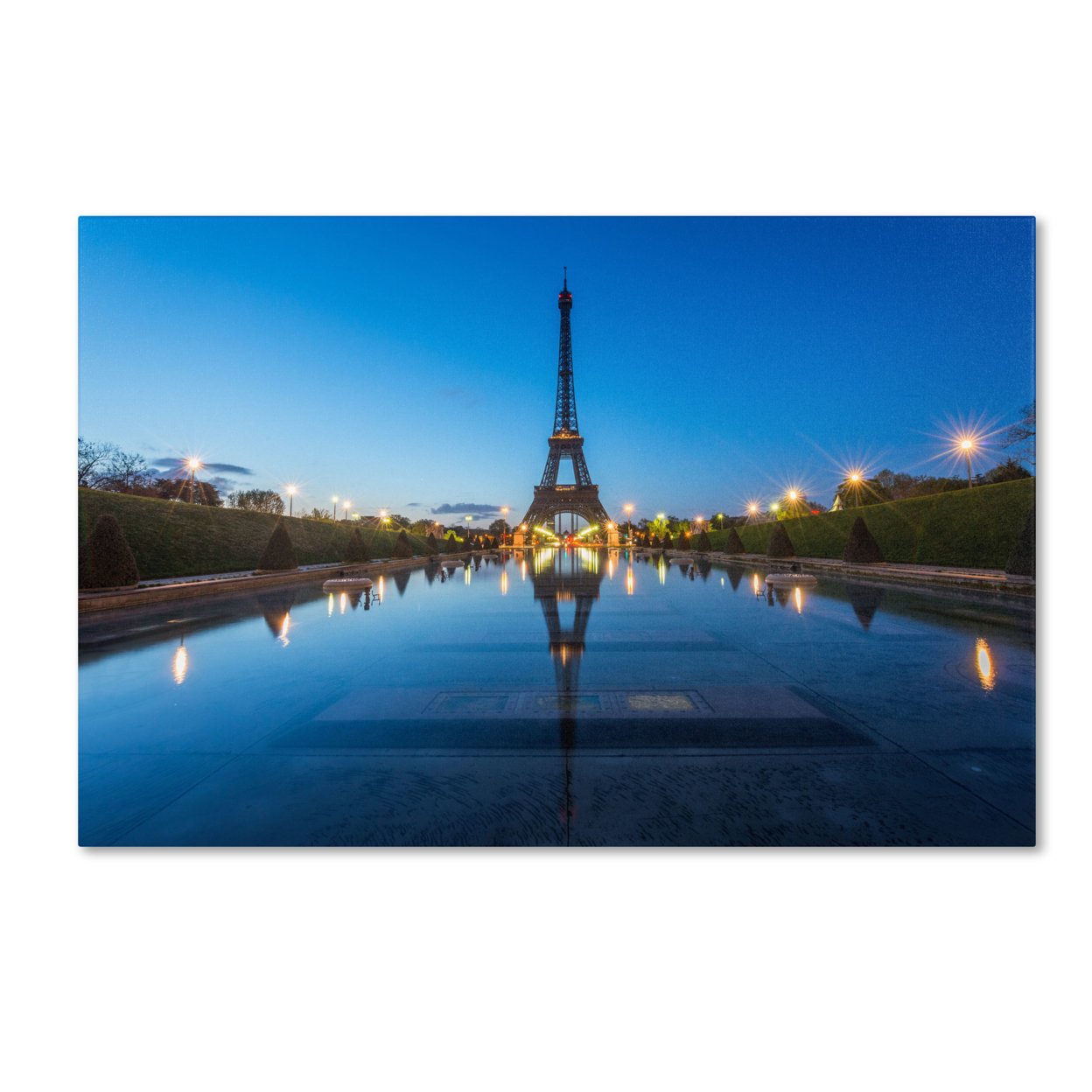Mathieu Rivrin 'Blue Hour In Front Of The Eiffel Tower' Canvas Art 16 X 24