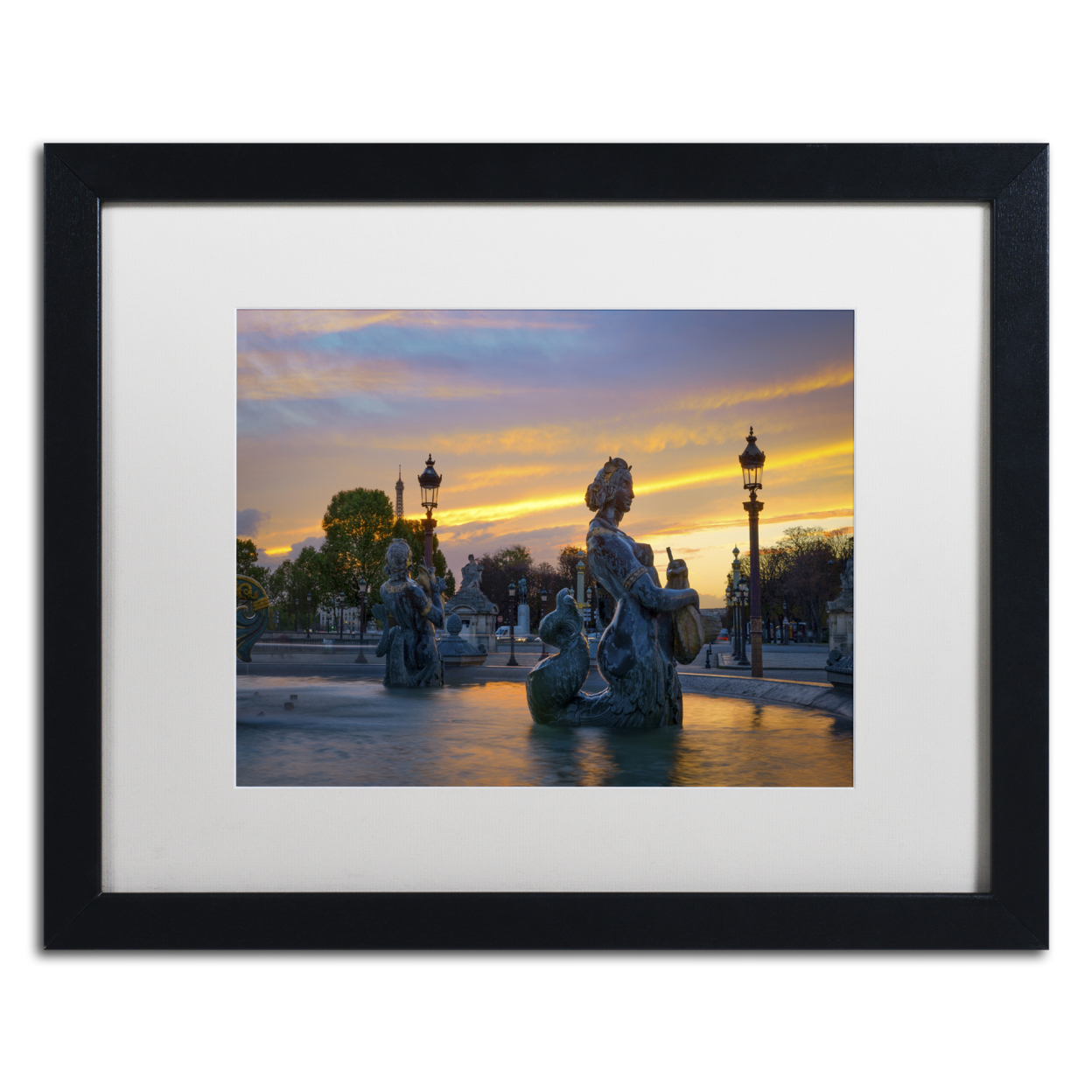 Mathieu Rivrin 'Sunset In Place De La Concorde' Black Wooden Framed Art 18 X 22 Inches