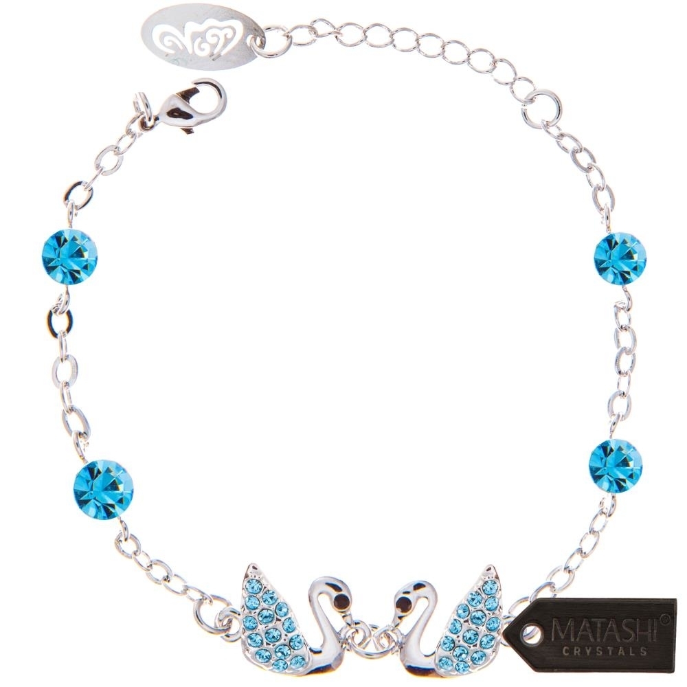 Rhodium Plated Bracelet With Loving Swans Design With Lobster Clasp And High Quality Ocean Blue Crystals By Matashi