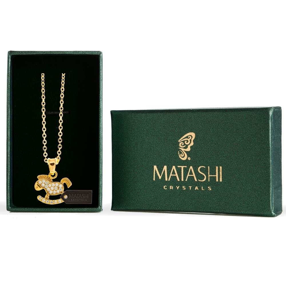 Champagne Gold Plated Necklace With Rocking Horse Design With A 16 Extendable Chain And High Quality Clear Crystals By Matashi