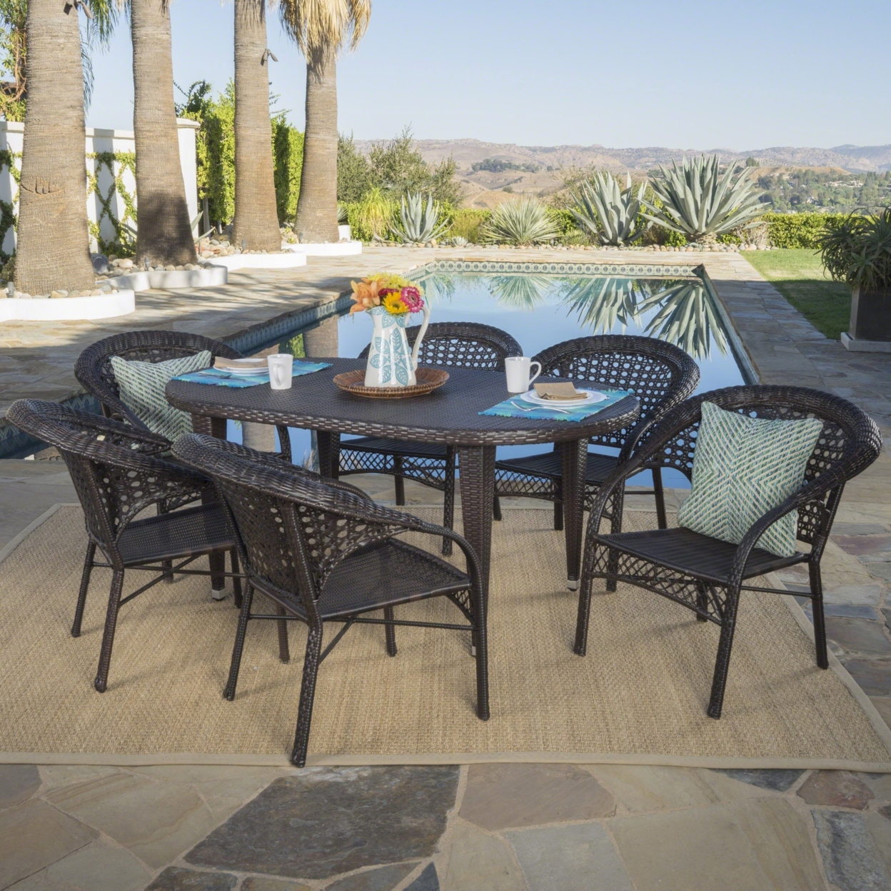 Alina Outdoor Traditional 7 Piece Wicker Oval Dining Set With Stacking Chairs