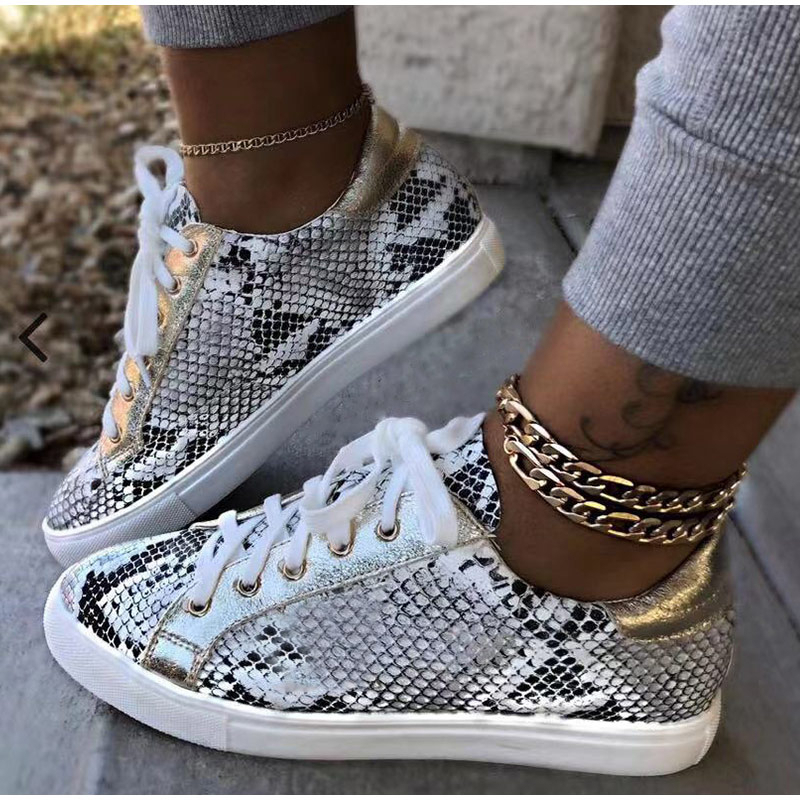 Snakeskin shops star sneakers