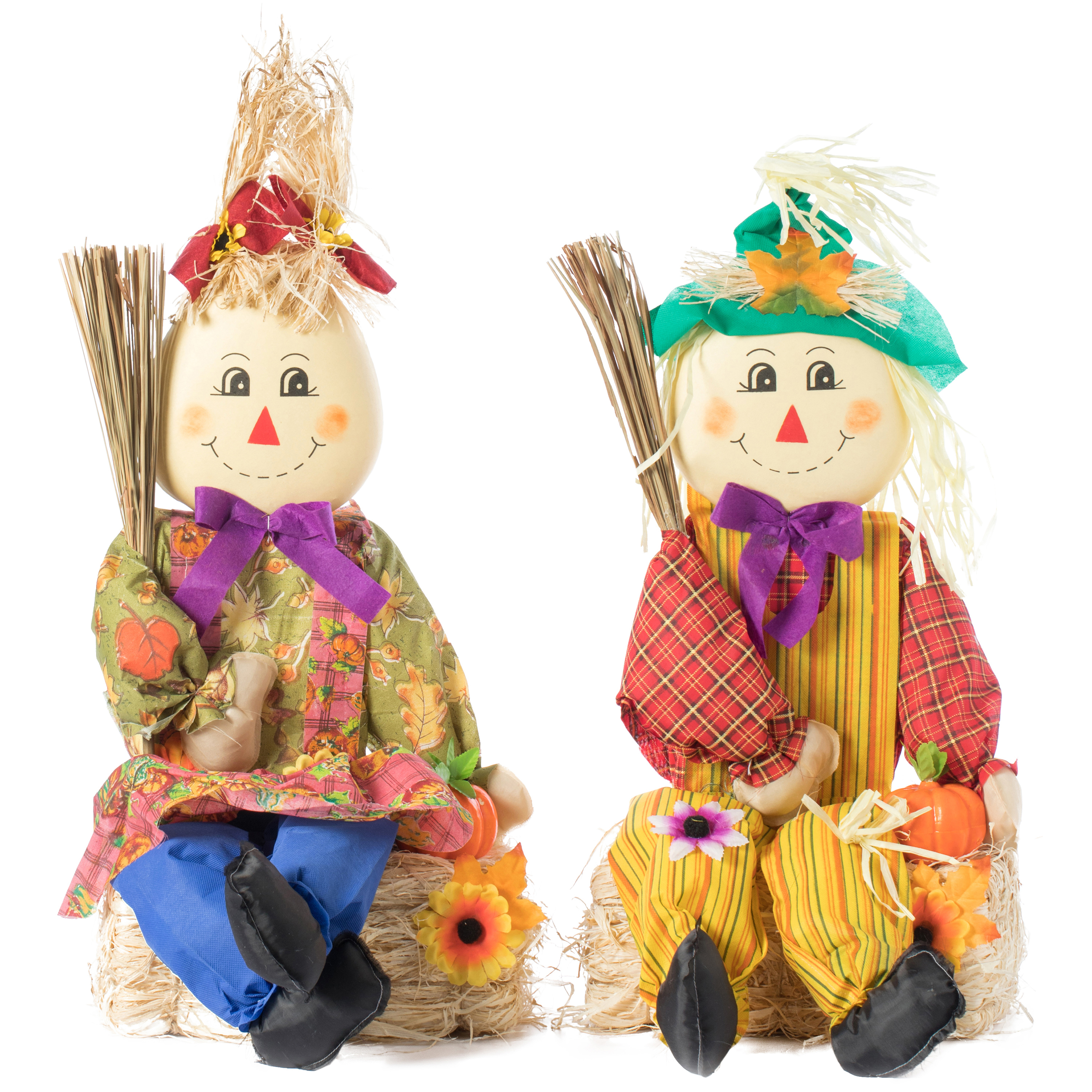 Set Of 2 Garden Scarecrows Sitting On Hay Bale