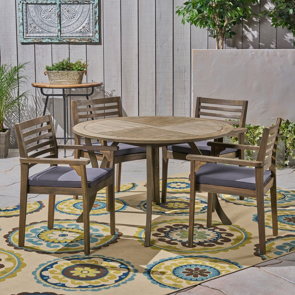 Phoenix Outdoor Acacia 4-Seater Dining Set With Cushions And 47 Round Table With Carved Legs - Gray