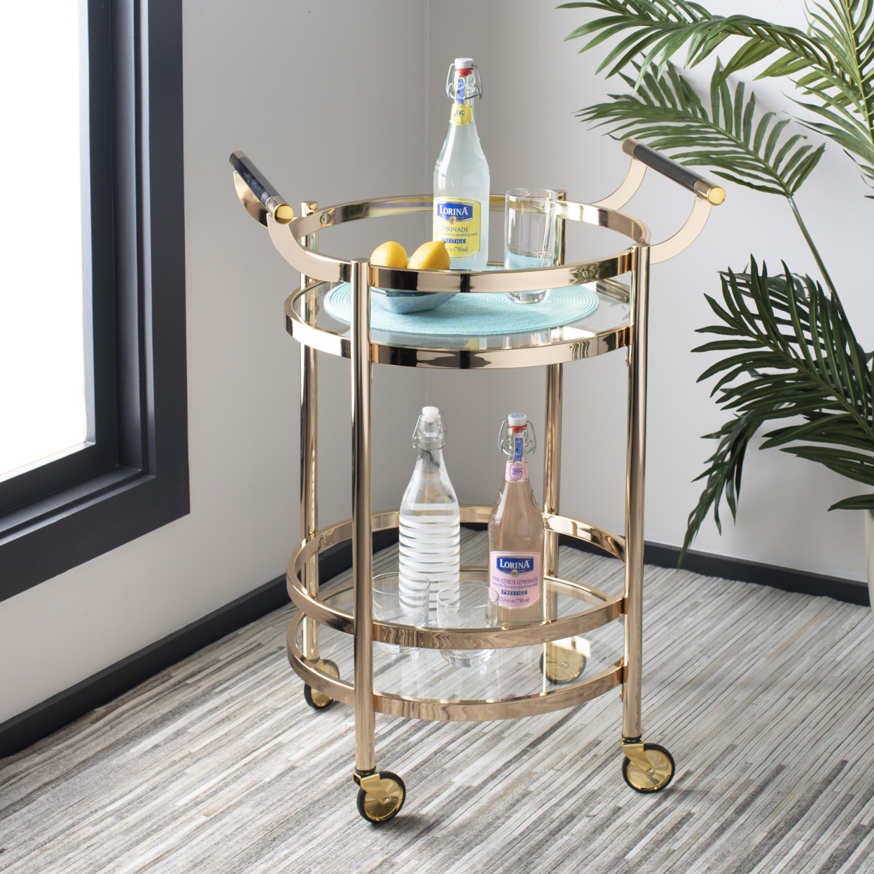 SAFAVIEH Sienna 2-Tier Round Bar Cart Gold / Glass